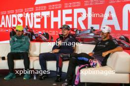 (L to R): Fernando Alonso (ESP) Aston Martin F1 Team; Max Verstappen (NLD) Red Bull Racing; and Pierre Gasly (FRA) Alpine F1 Team, in the post race FIA Press Conference. 27.08.2023. Formula 1 World Championship, Rd 14, Dutch Grand Prix, Zandvoort, Netherlands, Race Day.