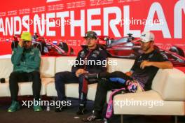 (L to R): Fernando Alonso (ESP) Aston Martin F1 Team; Max Verstappen (NLD) Red Bull Racing; and Pierre Gasly (FRA) Alpine F1 Team, in the post race FIA Press Conference. 27.08.2023. Formula 1 World Championship, Rd 14, Dutch Grand Prix, Zandvoort, Netherlands, Race Day.