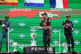 The podium (L to R): Fernando Alonso (ESP) Aston Martin F1 Team, second; Max Verstappen (NLD) Red Bull Racing, race winner; Pierre Gasly (FRA) Alpine F1 Team, third. 27.08.2023. Formula 1 World Championship, Rd 14, Dutch Grand Prix, Zandvoort, Netherlands, Race Day.