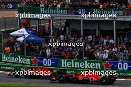 Carlos Sainz Jr (ESP) Ferrari SF-23 and Charles Leclerc (MON) Ferrari SF-23 battle for position. 27.08.2023. Formula 1 World Championship, Rd 14, Dutch Grand Prix, Zandvoort, Netherlands, Race Day.