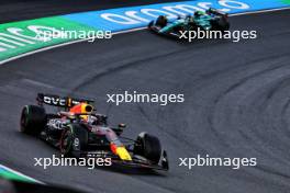 Max Verstappen (NLD) Red Bull Racing RB19 leads Fernando Alonso (ESP) Aston Martin F1 Team AMR23. 27.08.2023. Formula 1 World Championship, Rd 14, Dutch Grand Prix, Zandvoort, Netherlands, Race Day.