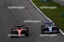 Pierre Gasly (FRA) Alpine F1 Team A523 and Carlos Sainz Jr (ESP) Ferrari SF-23 battle for position. 27.08.2023. Formula 1 World Championship, Rd 14, Dutch Grand Prix, Zandvoort, Netherlands, Race Day.