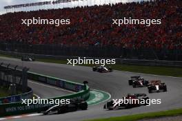 Lewis Hamilton (GBR) Mercedes AMG F1 W14 and Charles Leclerc (MON) Ferrari SF-23 battle for position. 27.08.2023. Formula 1 World Championship, Rd 14, Dutch Grand Prix, Zandvoort, Netherlands, Race Day.