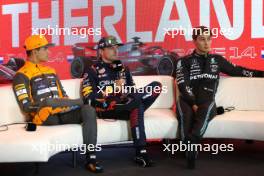 (L to R): Lando Norris (GBR) McLaren; Max Verstappen (NLD) Red Bull Racing; and George Russell (GBR) Mercedes AMG F1, in the post qualifying FIA Press Conference. 26.08.2023. Formula 1 World Championship, Rd 14, Dutch Grand Prix, Zandvoort, Netherlands, Qualifying Day.