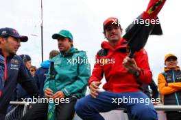 (L to R): Sergio Perez (MEX) Red Bull Racing with Fernando Alonso (ESP) Aston Martin F1 Team and Carlos Sainz Jr (ESP) Ferrari on the drivers' parade. 27.08.2023. Formula 1 World Championship, Rd 14, Dutch Grand Prix, Zandvoort, Netherlands, Race Day.