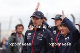 (L to R): Sergio Perez (MEX) Red Bull Racing with Yuki Tsunoda (JPN) AlphaTauri on the drivers' parade. 27.08.2023. Formula 1 World Championship, Rd 14, Dutch Grand Prix, Zandvoort, Netherlands, Race Day.