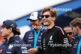 Alexander Albon (THA) Williams Racing with George Russell (GBR) Mercedes AMG F1 on the drivers' parade. 27.08.2023. Formula 1 World Championship, Rd 14, Dutch Grand Prix, Zandvoort, Netherlands, Race Day.