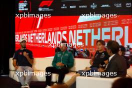 (L to R): Daniel Ricciardo (AUS) AlphaTauri; Fernando Alonso (ESP) Aston Martin F1 Team; and George Russell (GBR) Mercedes AMG F1, in the FIA Press Conference. 24.08.2023. Formula 1 World Championship, Rd 14, Dutch Grand Prix, Zandvoort, Netherlands, Preparation Day.