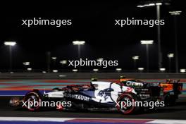 Yuki Tsunoda (JPN) AlphaTauri AT04 and Lando Norris (GBR) McLaren MCL60. 06.10.2023 Formula 1 World Championship, Rd 18, Qatar Grand Prix, Doha, Qatar, Qualifying Day.