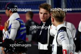 Logan Sargeant (USA) Williams Racing on the grid with Liam Lawson (NZL) AlphaTauri. 08.10.2023. Formula 1 World Championship, Rd 18, Qatar Grand Prix, Doha, Qatar, Race Day.