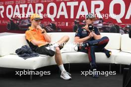 (L to R): Oscar Piastri (AUS) McLaren and Max Verstappen (NLD) Red Bull Racing in the post race FIA Press Conference. 08.10.2023. Formula 1 World Championship, Rd 18, Qatar Grand Prix, Doha, Qatar, Race Day.