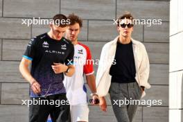 (L to R): Jack Doohan (AUS) Alpine F1 Team Reserve Driver; Pierre Gasly (FRA) Alpine F1 Team; and George Russell (GBR) Mercedes AMG F1. 07.10.2023. Formula 1 World Championship, Rd 18, Qatar Grand Prix, Doha, Qatar, Sprint Day.