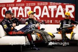 (L to R): Max Verstappen (NLD) Red Bull Racing; Oscar Piastri (AUS) McLaren; and Lando Norris (GBR) McLaren, in the post Sprint FIA Press Conference. 07.10.2023. Formula 1 World Championship, Rd 18, Qatar Grand Prix, Doha, Qatar, Sprint Day.