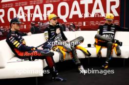 (L to R): Max Verstappen (NLD) Red Bull Racing; Oscar Piastri (AUS) McLaren; and Lando Norris (GBR) McLaren, in the post Sprint FIA Press Conference. 07.10.2023. Formula 1 World Championship, Rd 18, Qatar Grand Prix, Doha, Qatar, Sprint Day.