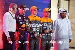 Sprint parc ferme top three (L to R): Stefano Domenicali (ITA) Formula One President and CEO; Max Verstappen (NLD) Red Bull Racing, second; Oscar Piastri (AUS) McLaren, winner; Lando Norris (GBR) McLaren, third; Mohammed Bin Sulayem (UAE) FIA President. 07.10.2023. Formula 1 World Championship, Rd 18, Qatar Grand Prix, Doha, Qatar, Sprint Day.