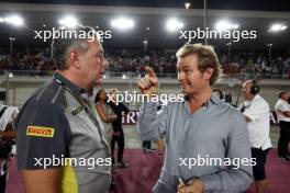 (L to R): Mario Isola (ITA) Pirelli Racing Manager with Nico Rosberg (GER). 07.10.2023. Formula 1 World Championship, Rd 18, Qatar Grand Prix, Doha, Qatar, Sprint Day.