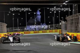 (L to R): Yuki Tsunoda (JPN) AlphaTauri AT04 and Sergio Perez (MEX) Red Bull Racing RB19. 17.03.2023. Formula 1 World Championship, Rd 2, Saudi Arabian Grand Prix, Jeddah, Saudi Arabia, Practice Day.