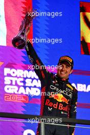 Race winner Sergio Perez (MEX) Red Bull Racing celebrates on the podium. 19.03.2023. Formula 1 World Championship, Rd 2, Saudi Arabian Grand Prix, Jeddah, Saudi Arabia, Race Day.