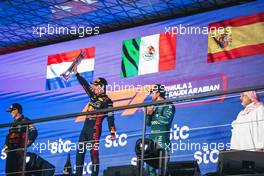 The podium (L to R): Max Verstappen (NLD) Red Bull Racing, second; Sergio Perez (MEX) Red Bull Racing, race winner; Fernando Alonso (ESP) Aston Martin F1 Team, Third. 19.03.2023. Formula 1 World Championship, Rd 2, Saudi Arabian Grand Prix, Jeddah, Saudi Arabia, Race Day.