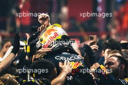 Race winner Sergio Perez (MEX) Red Bull Racing celebrates with the team in parc ferme. 19.03.2023. Formula 1 World Championship, Rd 2, Saudi Arabian Grand Prix, Jeddah, Saudi Arabia, Race Day.