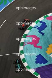 Sergio Perez (MEX) Red Bull Racing RB19 leads Fernando Alonso (ESP) Aston Martin F1 Team AMR23. 19.03.2023. Formula 1 World Championship, Rd 2, Saudi Arabian Grand Prix, Jeddah, Saudi Arabia, Race Day.