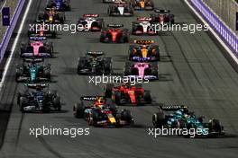 Fernando Alonso (ESP) Aston Martin F1 Team AMR23 leads Sergio Perez (MEX) Red Bull Racing RB19 at the start of the race. 19.03.2023. Formula 1 World Championship, Rd 2, Saudi Arabian Grand Prix, Jeddah, Saudi Arabia, Race Day.