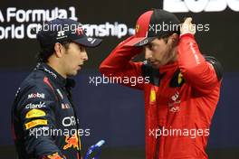 (L to R): Sergio Perez (MEX) Red Bull Racing with Charles Leclerc (MON) Ferrari in qualifying parc ferme. 18.03.2023. Formula 1 World Championship, Rd 2, Saudi Arabian Grand Prix, Jeddah, Saudi Arabia, Qualifying Day.