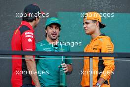 (L to R): Carlos Sainz Jr (ESP) Ferrari with Fernando Alonso (ESP) Aston Martin F1 Team and Lando Norris (GBR) McLaren on the drivers' parade. 19.03.2023. Formula 1 World Championship, Rd 2, Saudi Arabian Grand Prix, Jeddah, Saudi Arabia, Race Day.