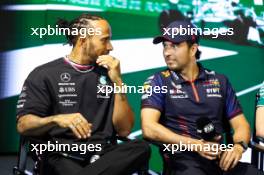 (L to R): Lewis Hamilton (GBR) Mercedes AMG F1 with Sergio Perez (MEX) Red Bull Racing, in the FIA Press Conference. 16.03.2023. Formula 1 World Championship, Rd 2, Saudi Arabian Grand Prix, Jeddah, Saudi Arabia, Preparation Day.