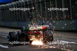 Zhou Guanyu (CHN) Alfa Romeo F1 Team C43 sends sparks flying. 15.09.2023. Formula 1 World Championship, Rd 16, Singapore Grand Prix, Marina Bay Street Circuit, Singapore, Practice Day.