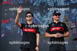 (L to R): Zhou Guanyu (CHN) Alfa Romeo F1 Team and Valtteri Bottas (FIN) Alfa Romeo F1 Team on the FanZone Stage. 15.09.2023. Formula 1 World Championship, Rd 16, Singapore Grand Prix, Marina Bay Street Circuit, Singapore, Practice Day.