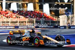 Oscar Piastri (AUS) McLaren MCL60. 15.09.2023. Formula 1 World Championship, Rd 16, Singapore Grand Prix, Marina Bay Street Circuit, Singapore, Practice Day.