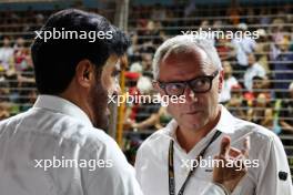 (L to R): Mohammed Bin Sulayem (UAE) FIA President with Stefano Domenicali (ITA) Formula One President and CEO on the grid. 17.09.2023. Formula 1 World Championship, Rd 16, Singapore Grand Prix, Marina Bay Street Circuit, Singapore, Race Day.