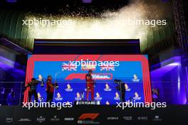 1st place  Carlos Sainz Jr (ESP) Ferrari with 2nd place Lando Norris (GBR) McLaren, Frederic Vasseur (FRA) Ferrari Team Principal and 3rd place  Lewis Hamilton (GBR) Mercedes AMG F1 . 17.09.2023. Formula 1 World Championship, Rd 16, Singapore Grand Prix, Marina Bay Street Circuit, Singapore, Race Day.