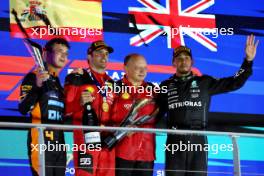 The podium (L to R): Lando Norris (GBR) McLaren, second; Carlos Sainz Jr (ESP) Ferrari, race winner; Frederic Vasseur (FRA) Ferrari Team Principal; Lewis Hamilton (GBR) Mercedes AMG F1, third. 17.09.2023. Formula 1 World Championship, Rd 16, Singapore Grand Prix, Marina Bay Street Circuit, Singapore, Race Day.