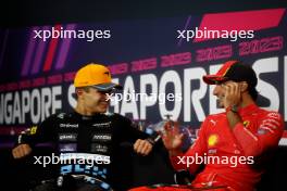 (L to R): Lando Norris (GBR) McLaren and Carlos Sainz Jr (ESP) Ferrari in the post race FIA Press Conference. 17.09.2023. Formula 1 World Championship, Rd 16, Singapore Grand Prix, Marina Bay Street Circuit, Singapore, Race Day.