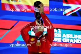 Race winner Carlos Sainz Jr (ESP) Ferrari celebrates on the podium. 17.09.2023. Formula 1 World Championship, Rd 16, Singapore Grand Prix, Marina Bay Street Circuit, Singapore, Race Day.