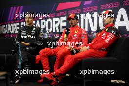 (L to R): George Russell (GBR) Mercedes AMG F1; Carlos Sainz Jr (ESP) Ferrari; and Charles Leclerc (MON) Ferrari, in the post qualifying FIA Press Conference. 16.09.2023. Formula 1 World Championship, Rd 16, Singapore Grand Prix, Marina Bay Street Circuit, Singapore, Qualifying Day.