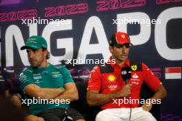 (L to R): Fernando Alonso (ESP) Aston Martin F1 Team and Carlos Sainz Jr (ESP) Ferrari in the FIA Press Conference. 14.09.2023. Formula 1 World Championship, Rd 16, Singapore Grand Prix, Marina Bay Street Circuit, Singapore, Preparation Day.