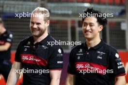 Zhou Guanyu (CHN) Alfa Romeo F1 Team walks the circuit with Atze Kerkhof (NLD) Alfa Romeo F1 Team Driver Performance Consultant. 14.09.2023. Formula 1 World Championship, Rd 16, Singapore Grand Prix, Marina Bay Street Circuit, Singapore, Preparation Day.