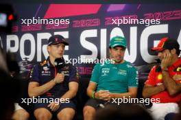 (L to R): Max Verstappen (NLD) Red Bull Racing; Fernando Alonso (ESP) Aston Martin F1 Team; and Carlos Sainz Jr (ESP) Ferrari, in the FIA Press Conference. 14.09.2023. Formula 1 World Championship, Rd 16, Singapore Grand Prix, Marina Bay Street Circuit, Singapore, Preparation Day.