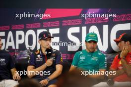 (L to R): Max Verstappen (NLD) Red Bull Racing; Fernando Alonso (ESP) Aston Martin F1 Team; and Carlos Sainz Jr (ESP) Ferrari, in the FIA Press Conference. 14.09.2023. Formula 1 World Championship, Rd 16, Singapore Grand Prix, Marina Bay Street Circuit, Singapore, Preparation Day.