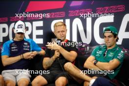 (L to R): Logan Sargeant (USA) Williams Racing; Kevin Magnussen (DEN) Haas F1 Team; and Lance Stroll (CDN) Aston Martin F1 Team, in the FIA Press Conference. 14.09.2023. Formula 1 World Championship, Rd 16, Singapore Grand Prix, Marina Bay Street Circuit, Singapore, Preparation Day.