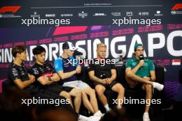 (L to R): George Russell (GBR) Mercedes AMG F1; Zhou Guanyu (CHN) Alfa Romeo F1 Team; Logan Sargeant (USA) Williams Racing; Kevin Magnussen (DEN) Haas F1 Team, and Lance Stroll (CDN) Aston Martin F1 Team in the FIA Press Conference. 14.09.2023. Formula 1 World Championship, Rd 16, Singapore Grand Prix, Marina Bay Street Circuit, Singapore, Preparation Day.