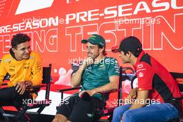 (L to R): Lando Norris (GBR) McLaren; Fernando Alonso (ESP) Aston Martin F1 Team, and Carlos Sainz Jr (ESP) Ferrari, in the FIA Press Conference. 25.02.2023. Formula 1 Testing, Sakhir, Bahrain, Day Three.