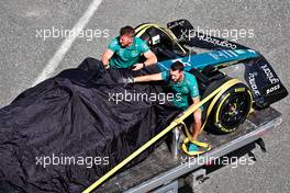 The Aston Martin F1 Team AMR23 of Felipe Drugovich (BRA) Aston Martin F1 Team, Reserve and Development Programme Driver is recovered back to the pits on the back of a truck. 23.02.2023. Formula 1 Testing, Sakhir, Bahrain, Day One.