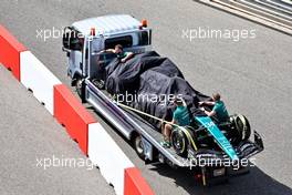 The Aston Martin F1 Team AMR23 of Felipe Drugovich (BRA) Aston Martin F1 Team, Reserve and Development Programme Driver is recovered back to the pits on the back of a truck. 23.02.2023. Formula 1 Testing, Sakhir, Bahrain, Day One.