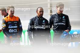 (L to R): Oscar Piastri (AUS) McLaren with Lewis Hamilton (GBR) Mercedes AMG F1 and George Russell (GBR) Mercedes AMG F1. 23.02.2023. Formula 1 Testing, Sakhir, Bahrain, Day One.