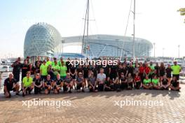 Teams and Pirelli motorhome hospitality group photograph. 28.11.2023. Formula 1 Testing, Yas Marina Circuit, Abu Dhabi, Tuesday.