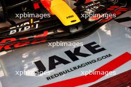 Jake Dennis (GBR) Red Bull Racing RB19 Test Driver - garage floor. 28.11.2023. Formula 1 Testing, Yas Marina Circuit, Abu Dhabi, Tuesday.